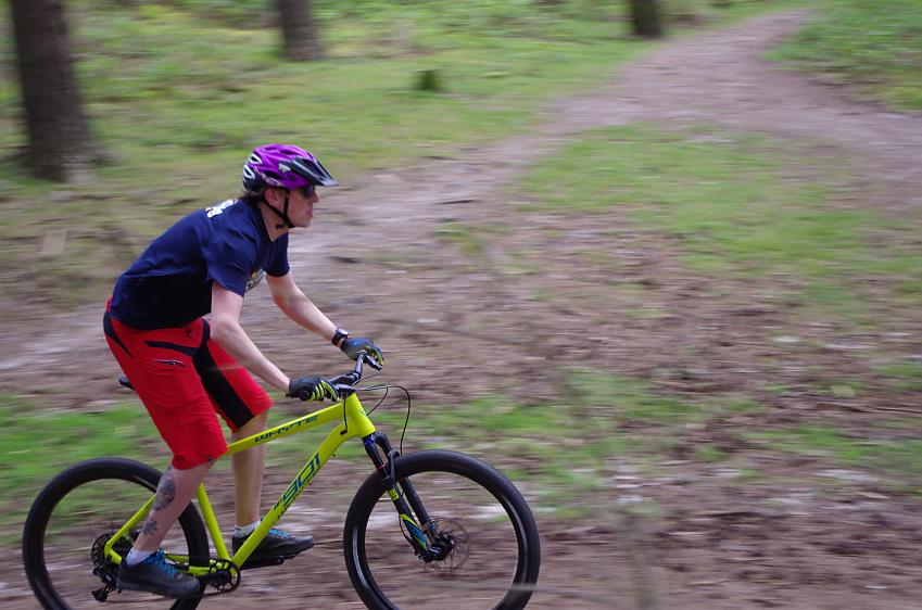 A cyclist on a mountain bike with a blurred background