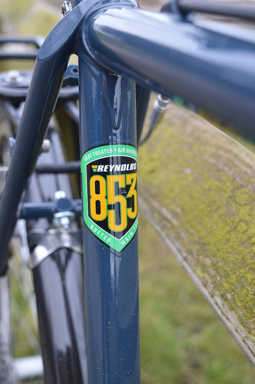 A close-up of a sticker on the bike's seat tube; it reads Reynolds 853