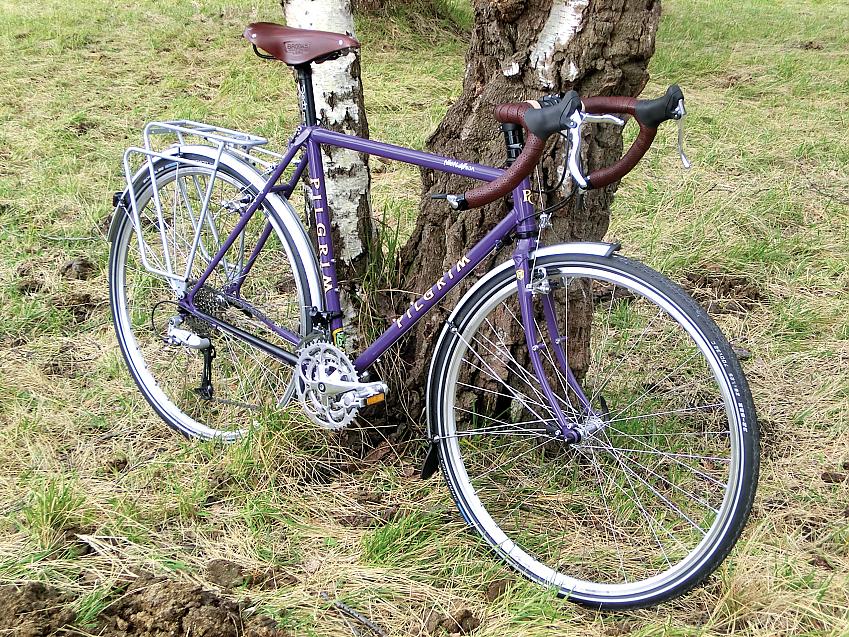 Pilgrim Cycles Northdown, a purple bike leaning against a tree