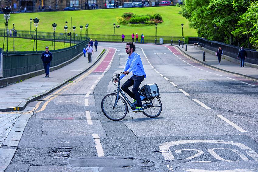 A cyclist riding in a 20mph zone in Edinburgh