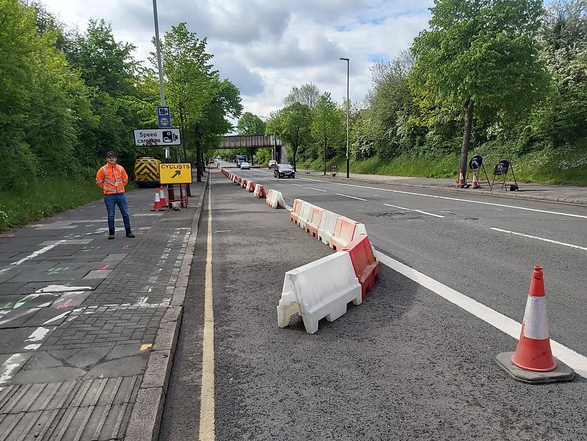 Barriers creating temporary cycle lane