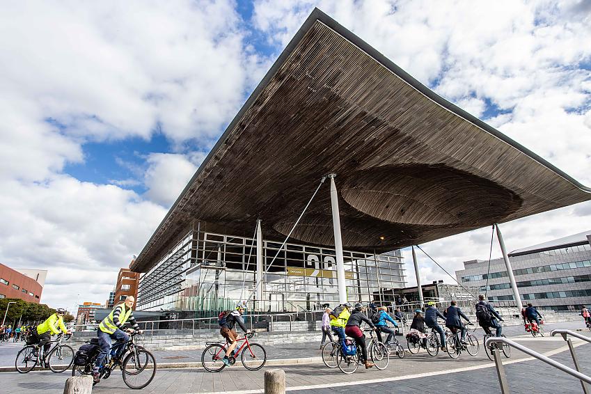 Group of people cycling through Cardiff to the Senedd
