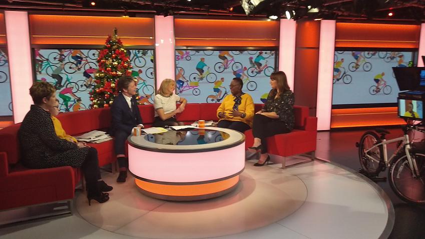 Jenny Box with Real Yellow Jersey winners Joy Anibaba and Declan Nangle on the BBC red sofa