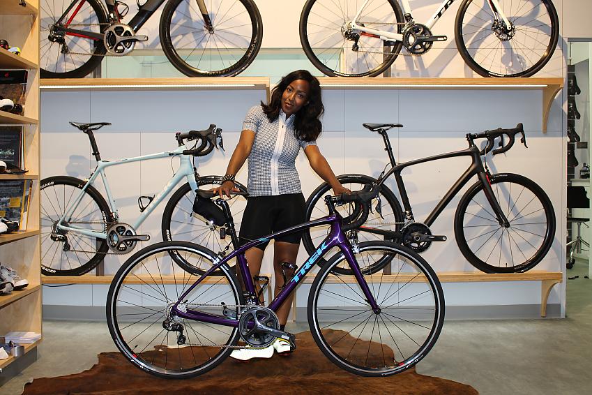 Angellica Bell and her Trek bike; Angellica has been nominated as one of Cycling UK's 100 Women in Cycling