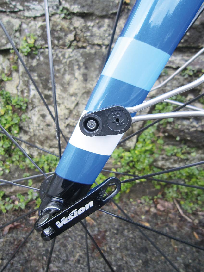 A close-up of the Tifosi's fork and hub showing the quick-release mechanism