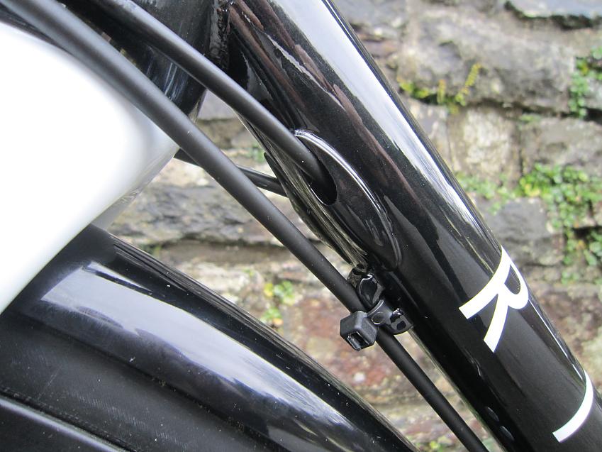 A close-up showing the Ribble's gear cables going into the frame of the bike