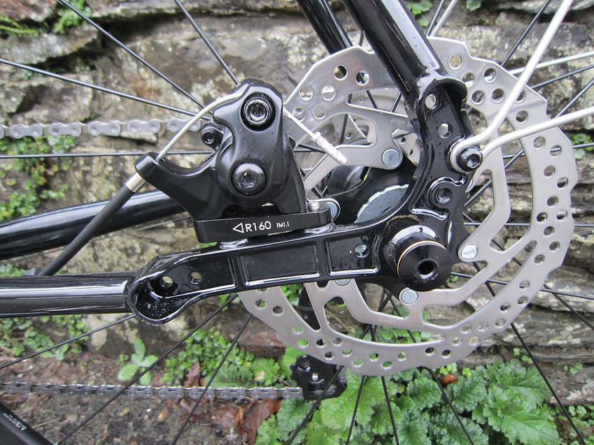 A close-up of the Ribble's chain stay and disc brakes
