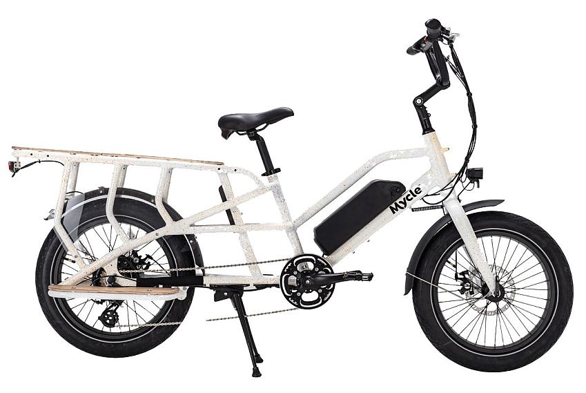 The Mycle Cargo, a white small-wheeled e-cargo bike with kickstand