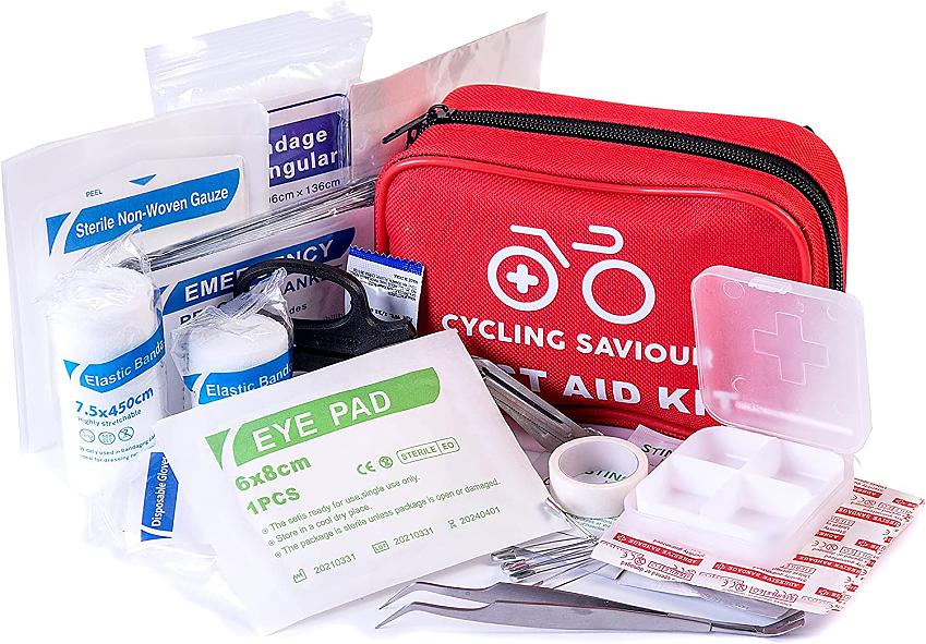 A cycling first aid kit comprising eye pad, bandages, tape, disposable gloves, safety pins, plasters and tweezers, with a red bag to store it all in