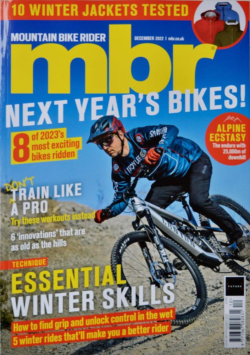 Mountain Bike Rider cover, December 22, showing a man on a silver Canyon mountain bike riding downhill on a gravel track