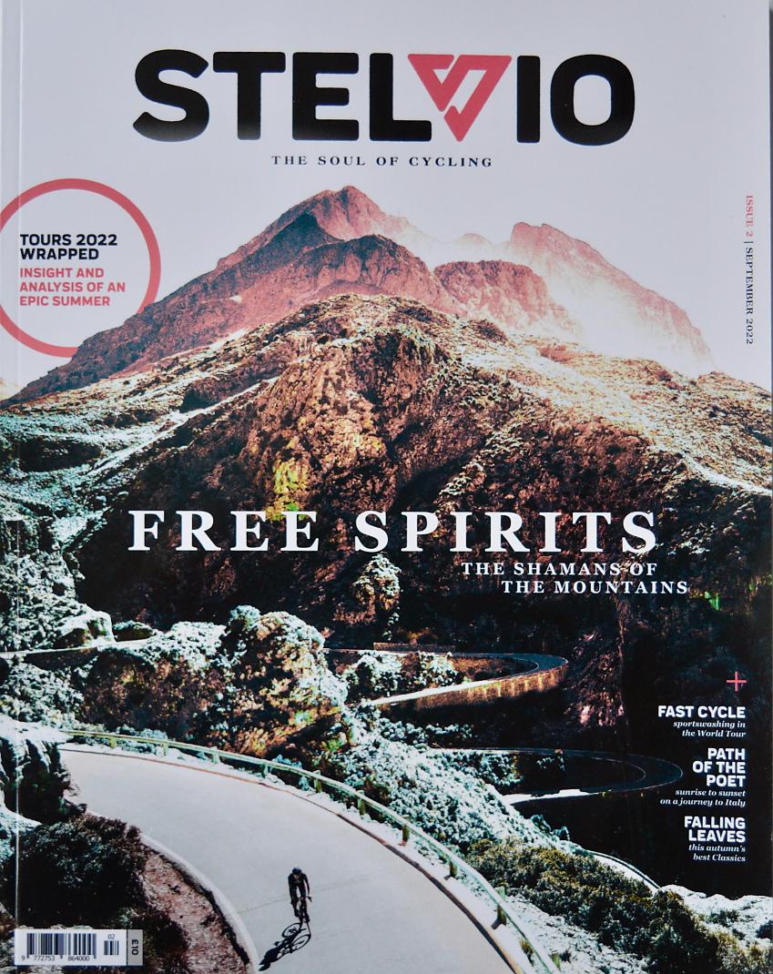 Stelvio September 22 issue cover, showing road winding down a mountain, with a person on a road bike cycling down it