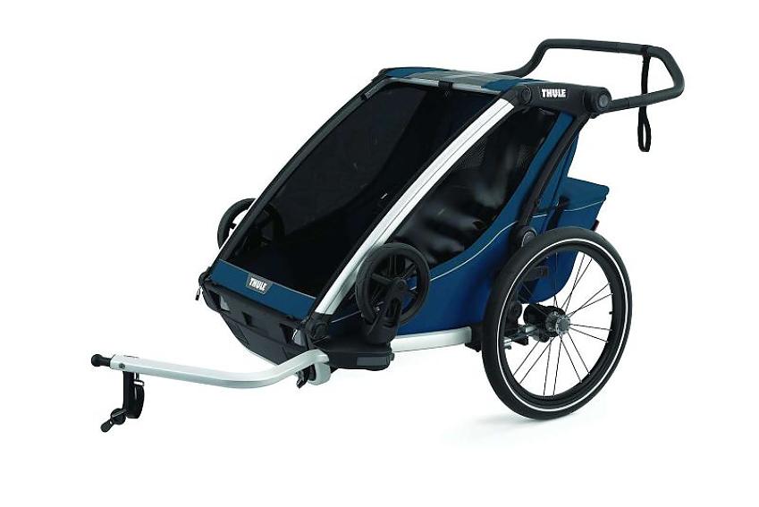 The Thule Chariot Cross, a blue child trailer for a bike