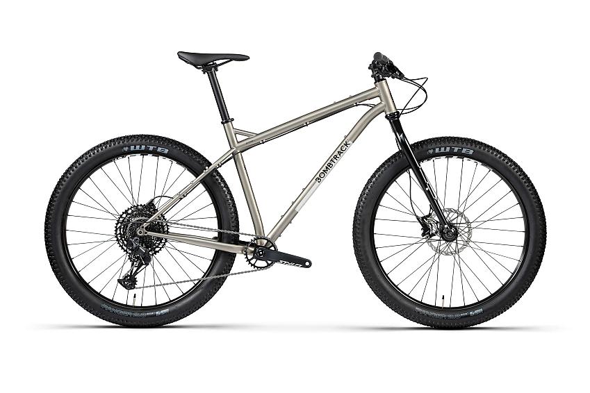 Bombtrack Beyond+, a silver mountain bike, much more conventional looking