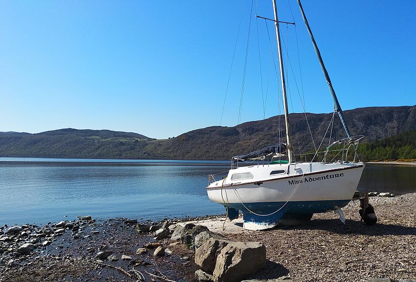 A boat on the shore of Loch Ness
