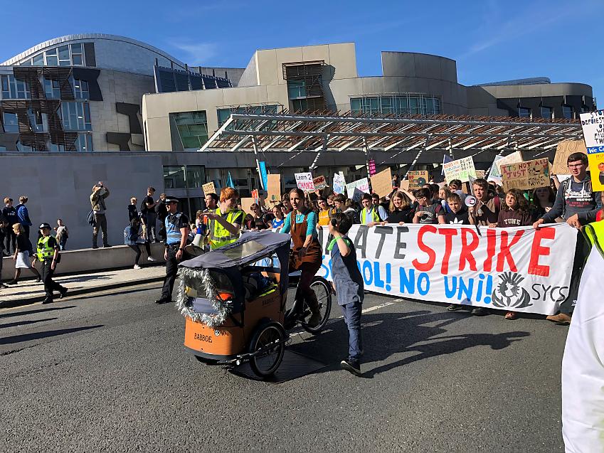 People taking part in a climate strike in Edinburgh