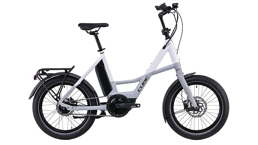 A small white and grey step-through e-cycle 
