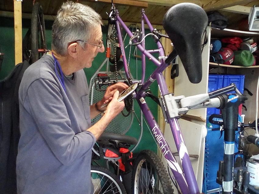Davin Palmer fixing bikes for the community