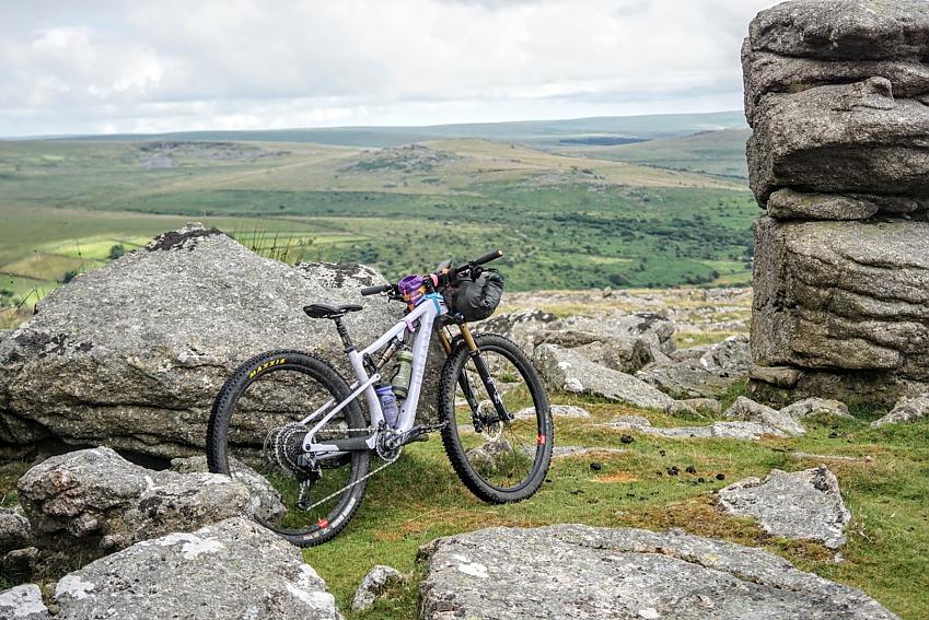 Bikepacking full-suspension mountain bike setup on Dartmoor Merrivale
