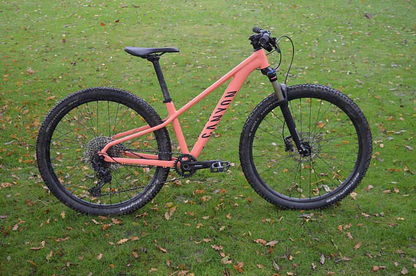A salmon-pink Canyon mountain bike
