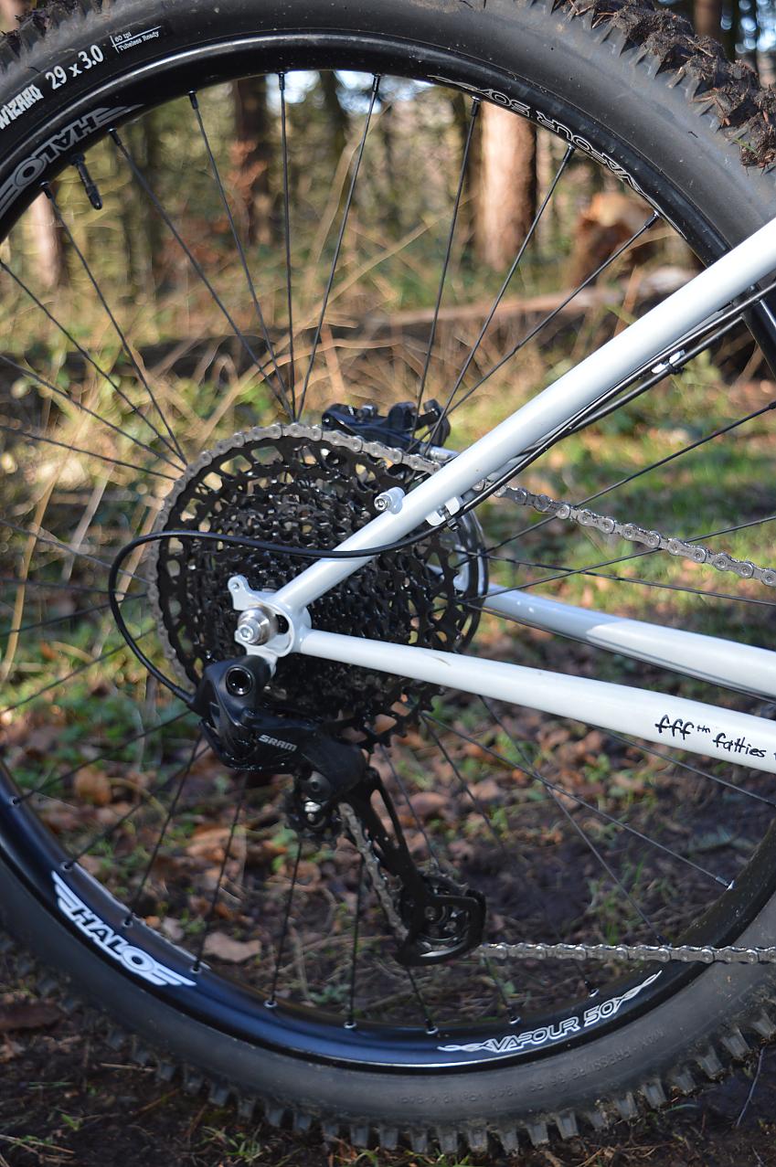 A close-up of the Surly's chainstay, seatstay, cassette and rear derailleur