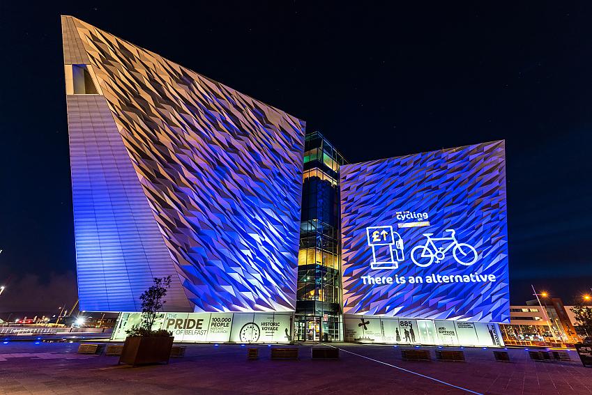 Lighting up the Titanic Museum in Belfast with the pro-cycling message "There is an alternative"