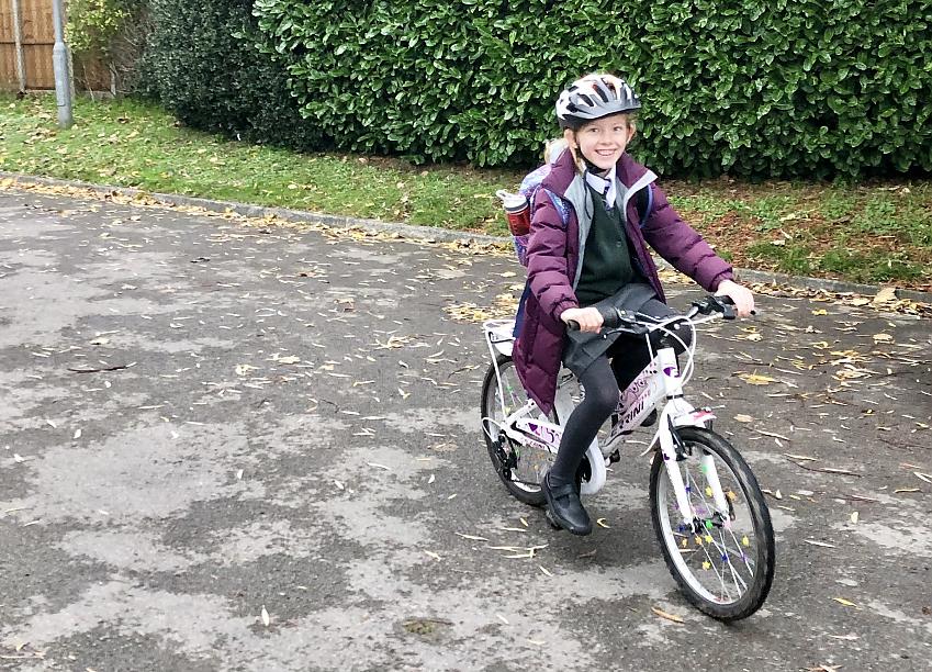 Isla riding to school with confidence after training