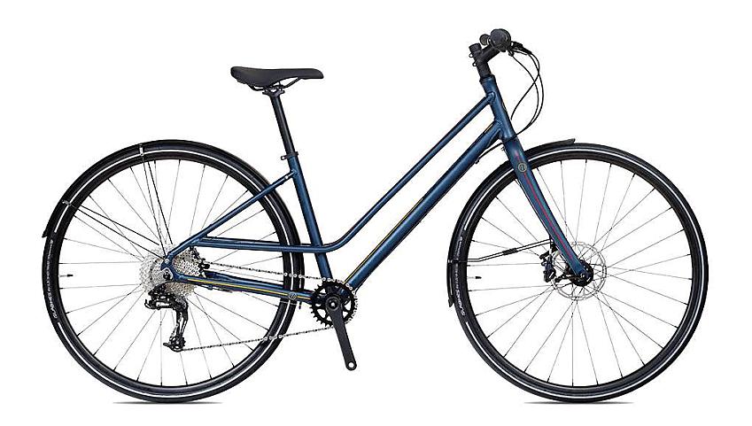The Islabikes Janis, a blue step-through bike with flat handlebar