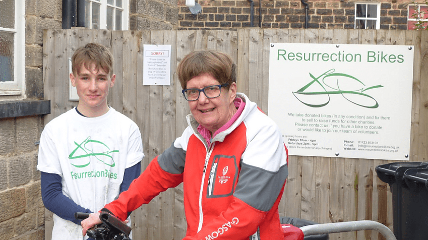 Janet with Resurrection Bikes volunteer William