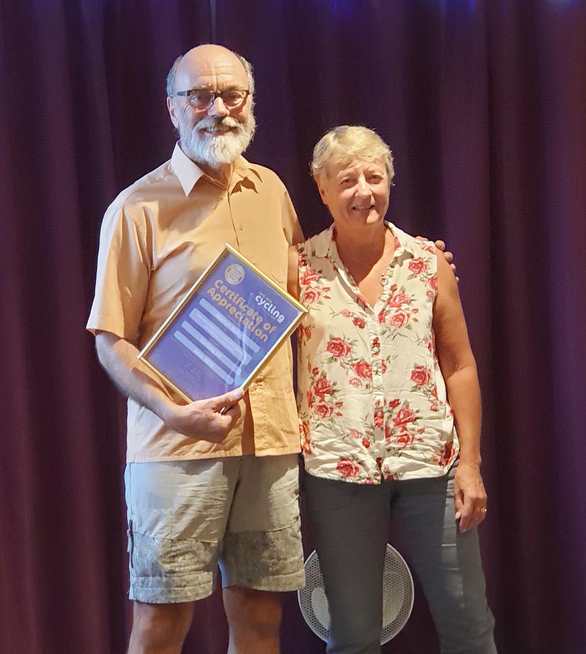 Martyn Aldis, with wife Margaret, receives his Certificate of Appreciation from Cycling UK