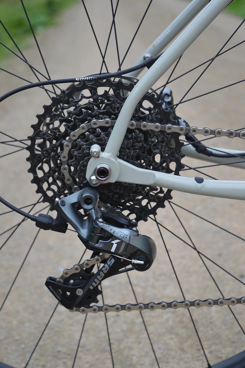 A close-up of the Mason's cassette and rear derailleur