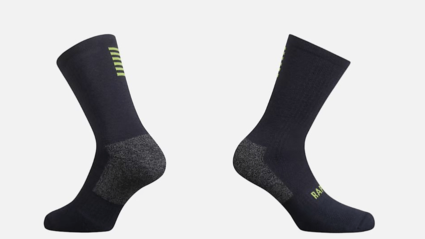 Two black socks on a white background