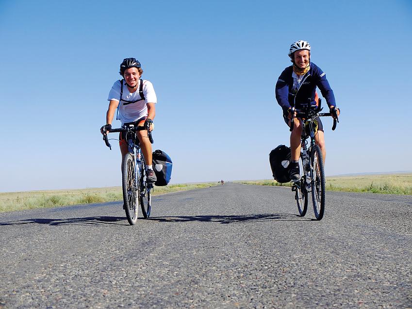 Will (left) and Charles ride through Kazakhstan