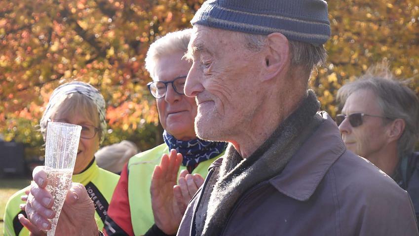 Russ Mantle toasting his millionth mile in 2019; photo by Cycling UK