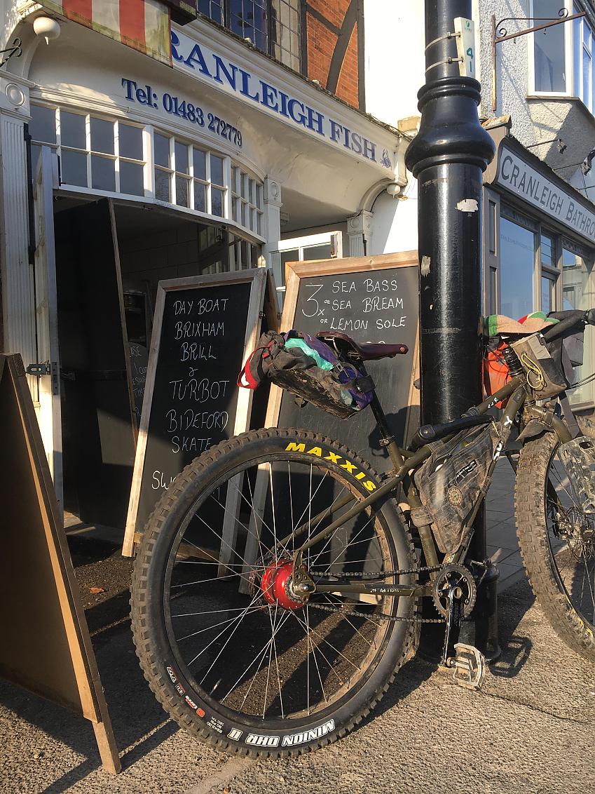 A bike locked up outside a fishmongers