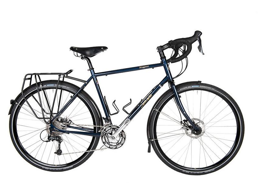 Spa Cycles Wayfarer, a blue touring bike with drop handlebar, rear rack and mudguards