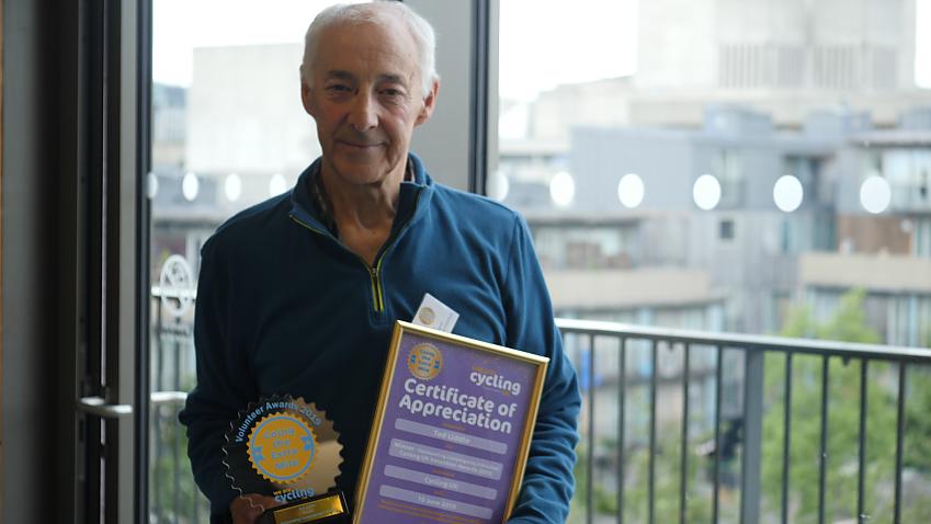 Ted Liddle with his award and certificate