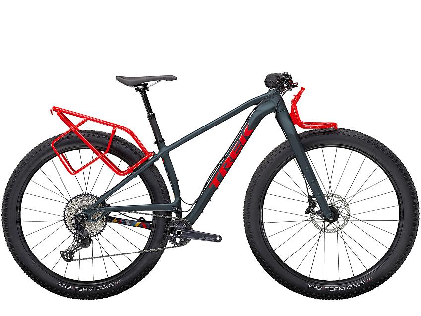 Trek 1120, a grey and red mountain bike with front and rear racks. It looks quite odd