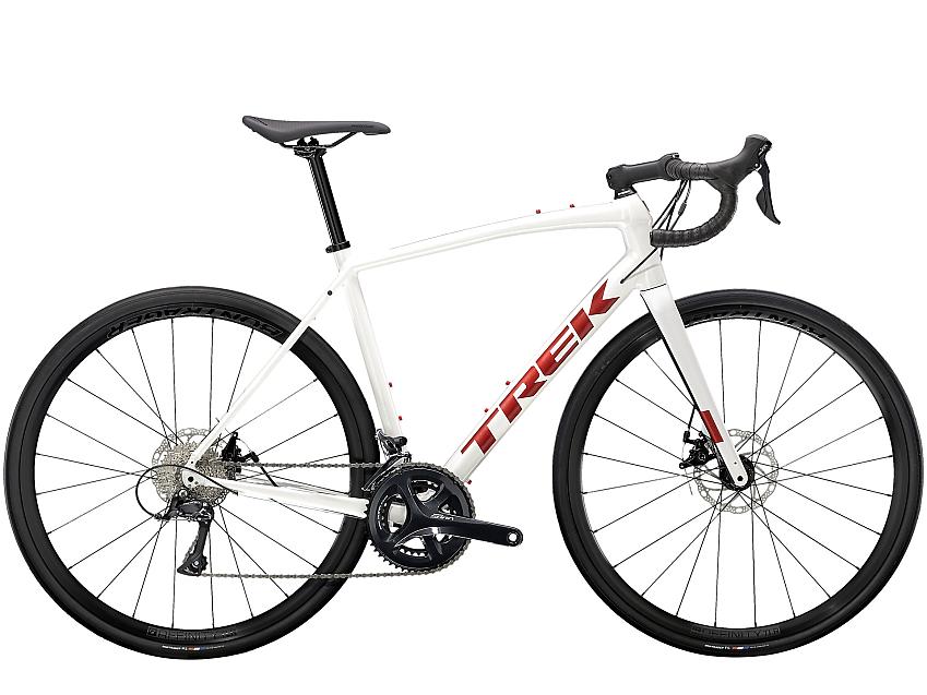Trek Domane AL3 Disc, a white road bike with red logo