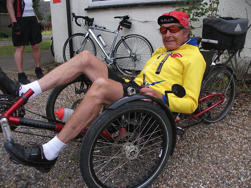 John Davis on his recumbent with his Tri-Vets date bars. Photo by Brian Penny