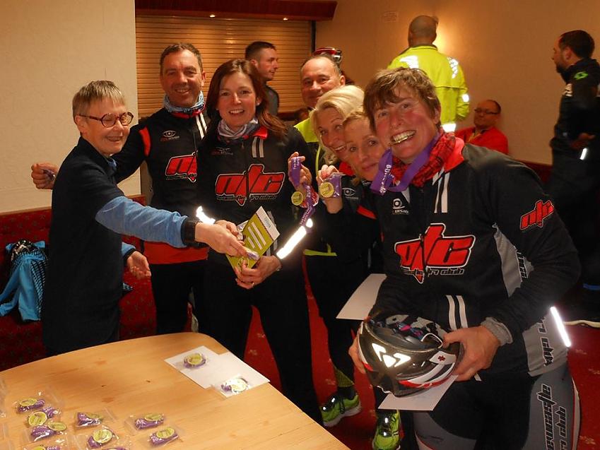 Early Season Challenge riders celebrate with certificates and medals