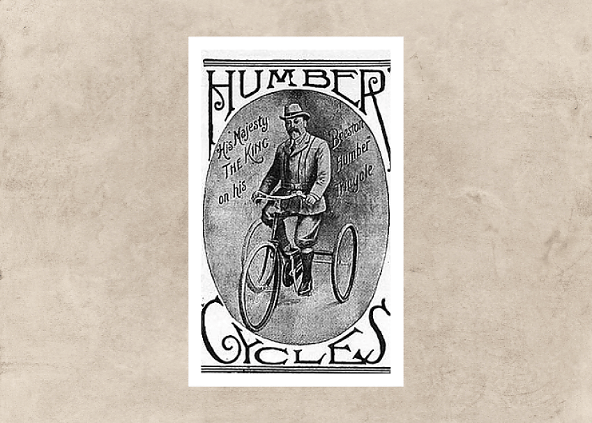 A black and white advert showing King George V on his Humber tricycle