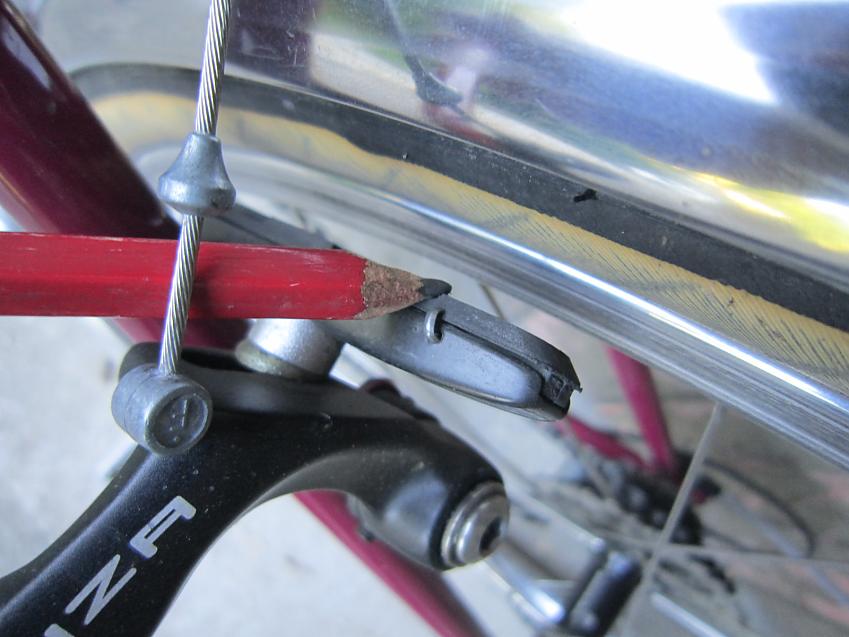 A close-up of a rim brake on a bicycle