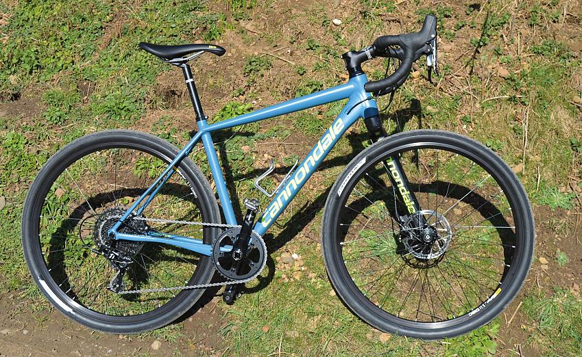 The Cannondale Slate Apex - a blue bike with chunky tyres and drop bars